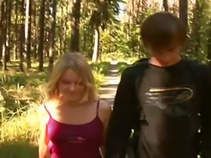 Pretty blonde is fucked in the woods and gets cum on her tum. Odd video, she...