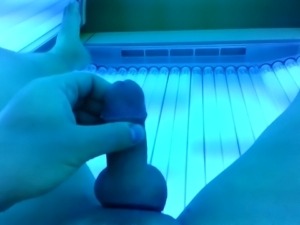 jerking off in tanning room