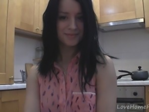 Splendid teen with glasses chatting in the kitchen