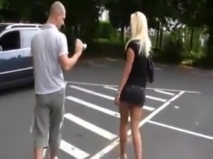 pretty german blonde slut sucks a guy on a parking